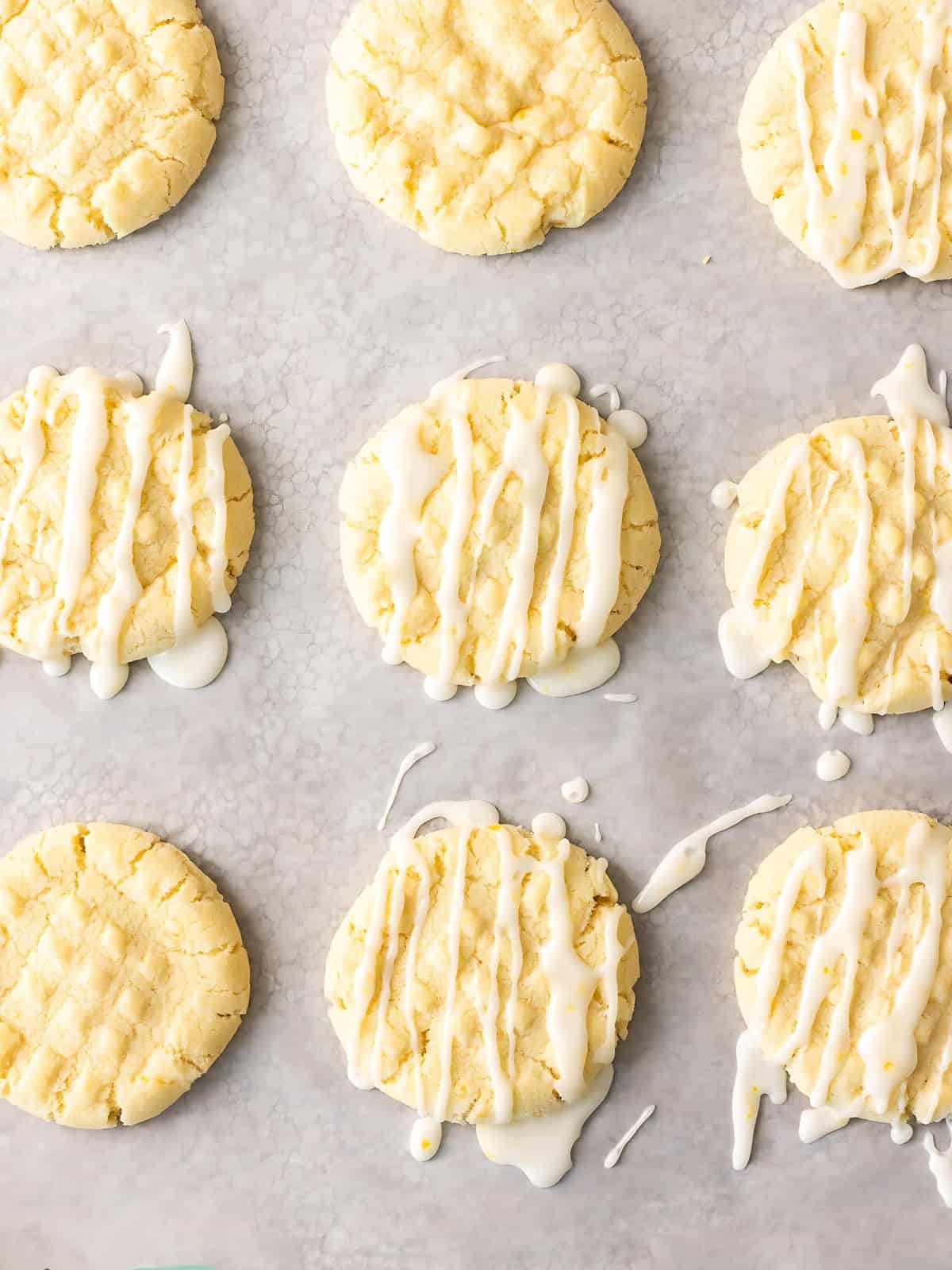 Lemon shortbread cookies drizzled with cream.