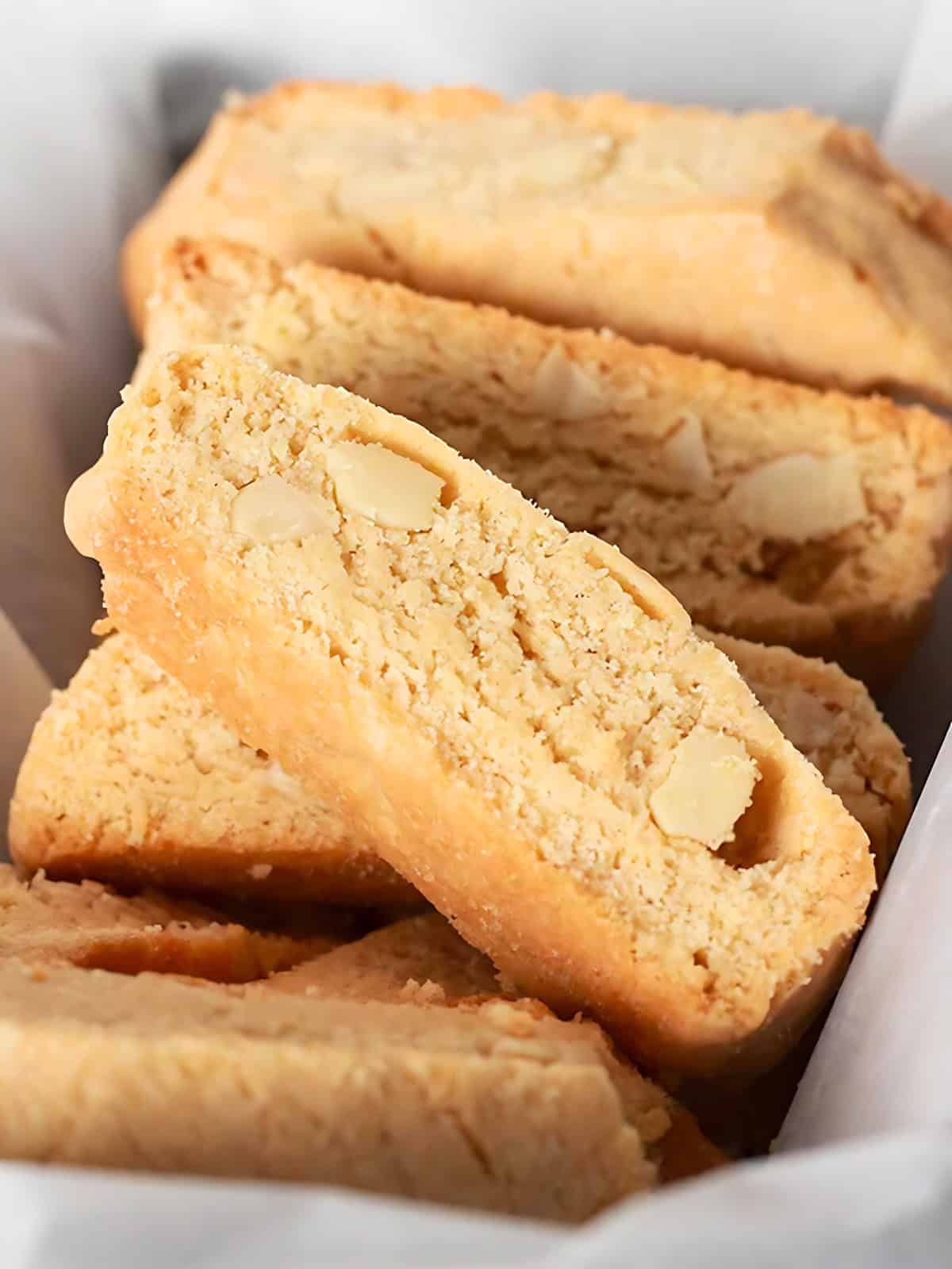 Vegan almond biscotti in a tray.