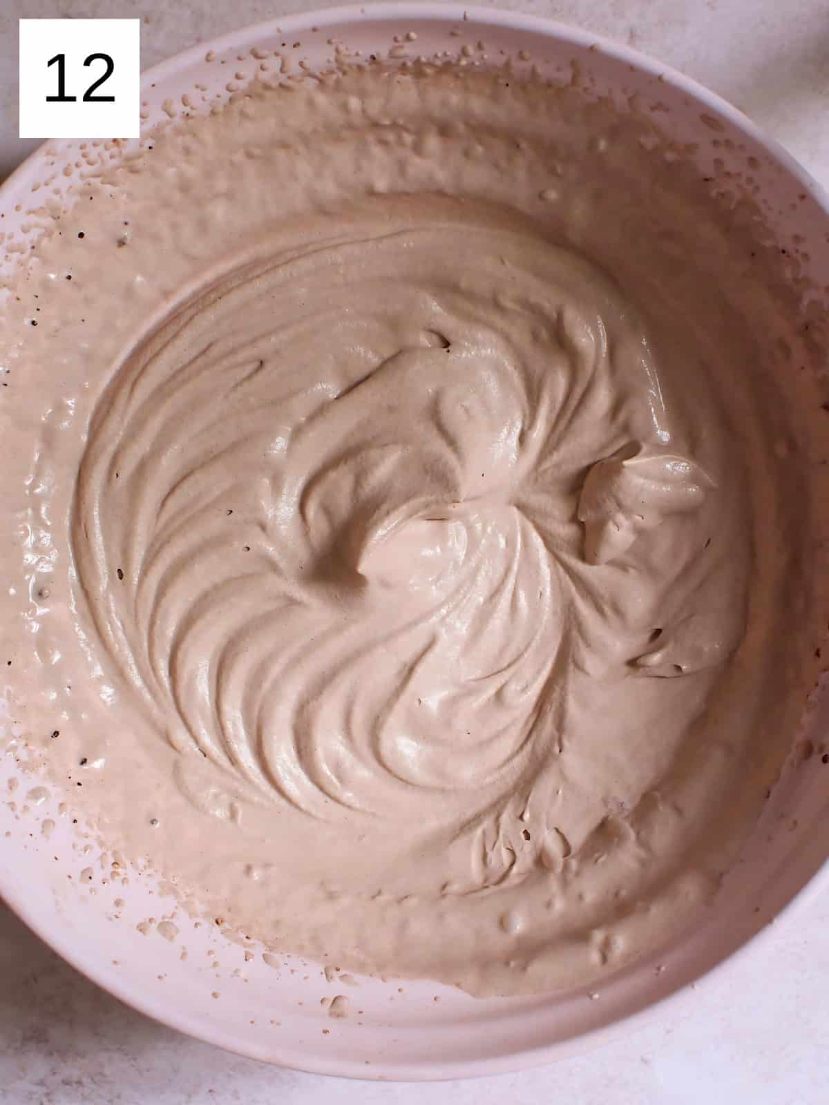 Whipped heavy cream and cocoa powder.