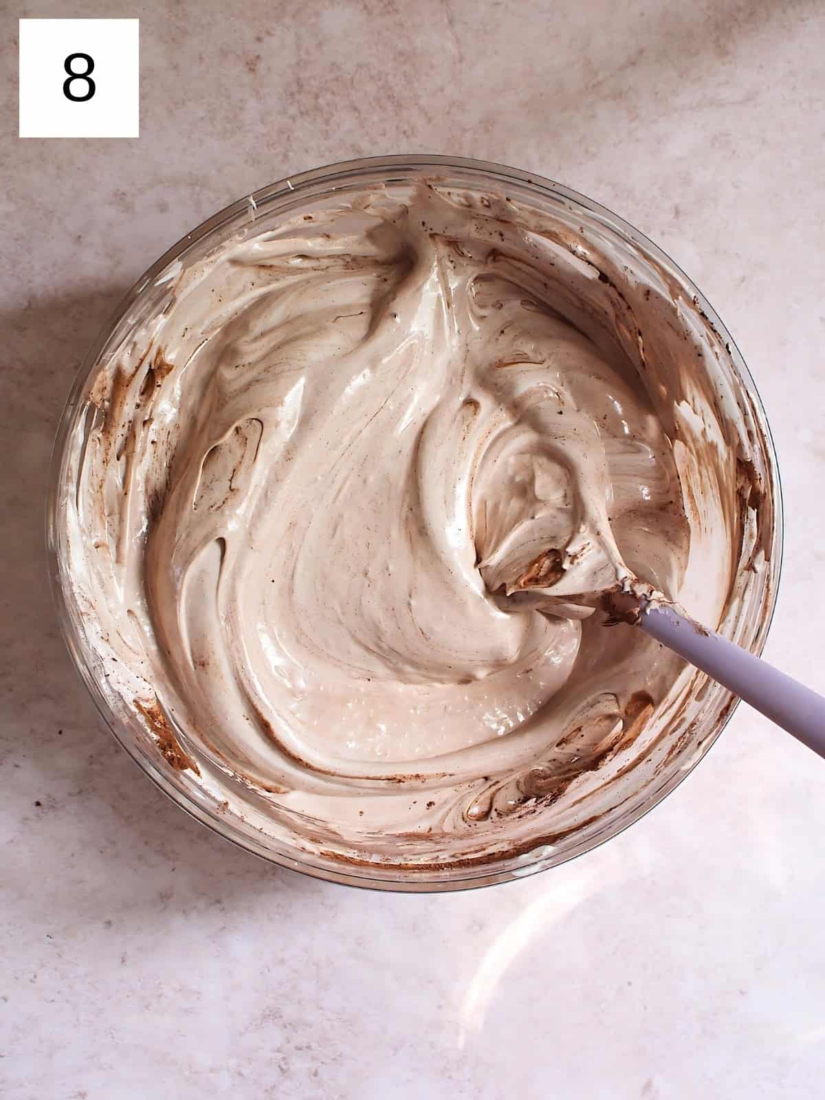 A bowl of fully mixed meringue mixture.