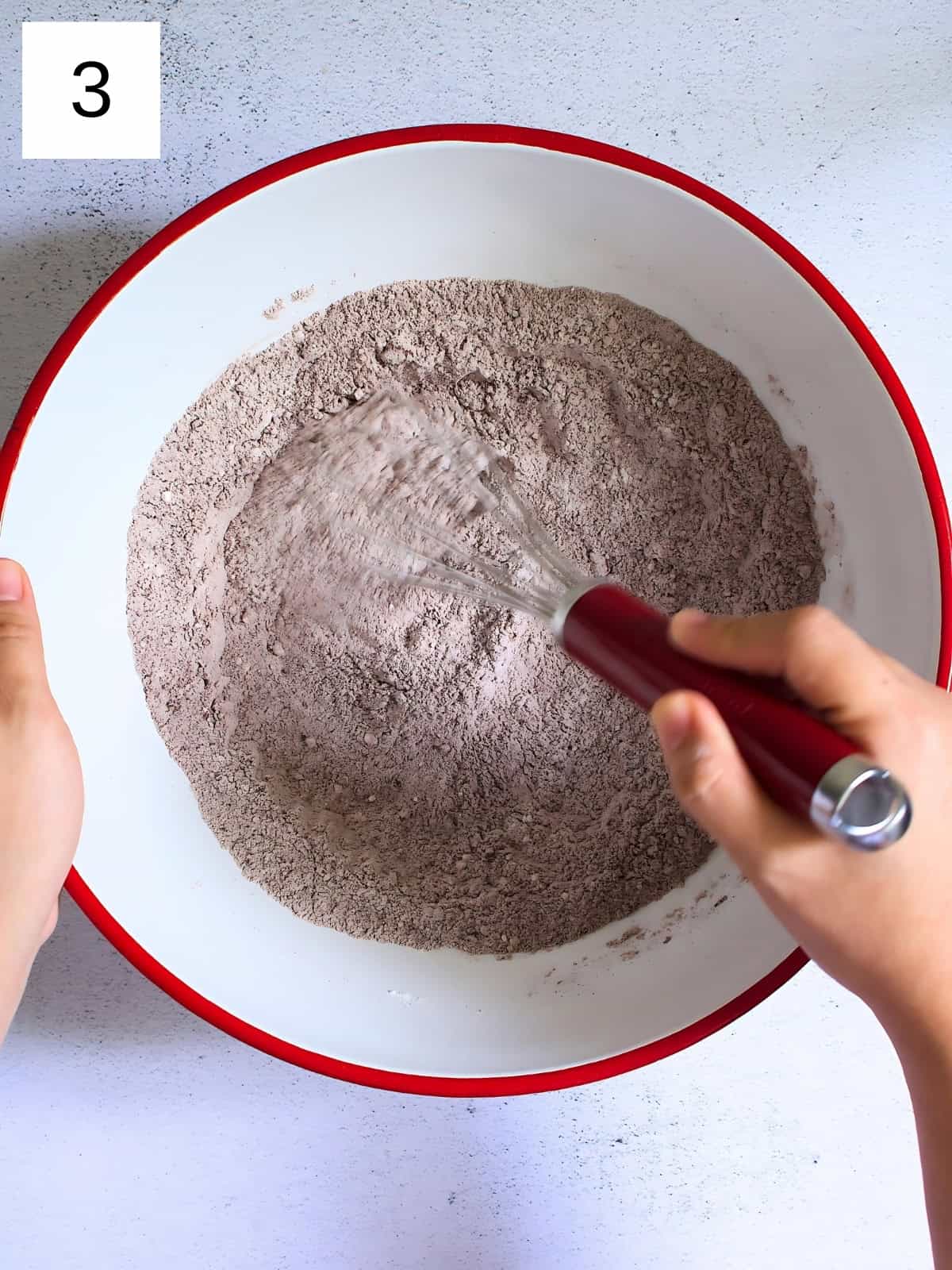 white sugar, cocoa powder, all purpose flour, and salt being whisked.