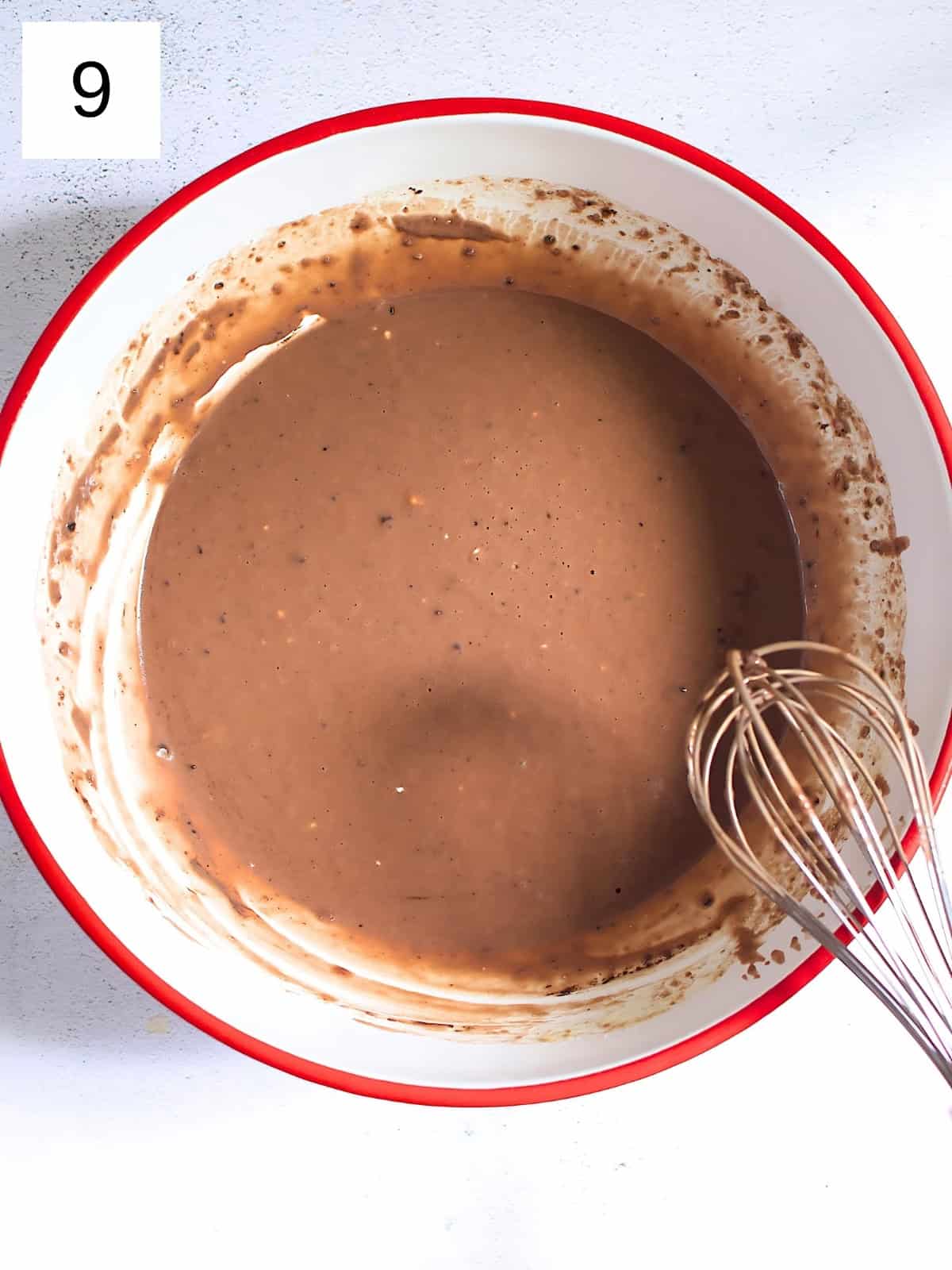 A bowl of chocolate waffle batter.