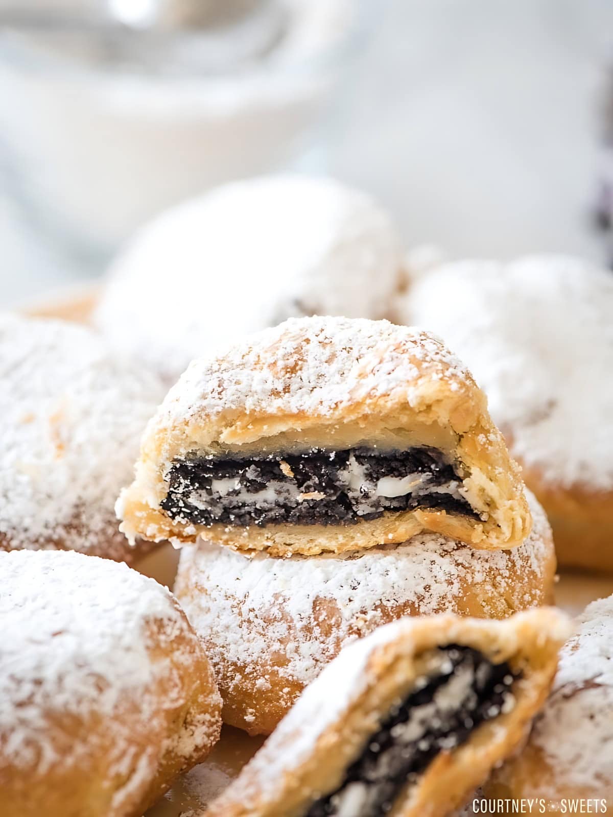 Air fried oreos covereed with powdered sugar.