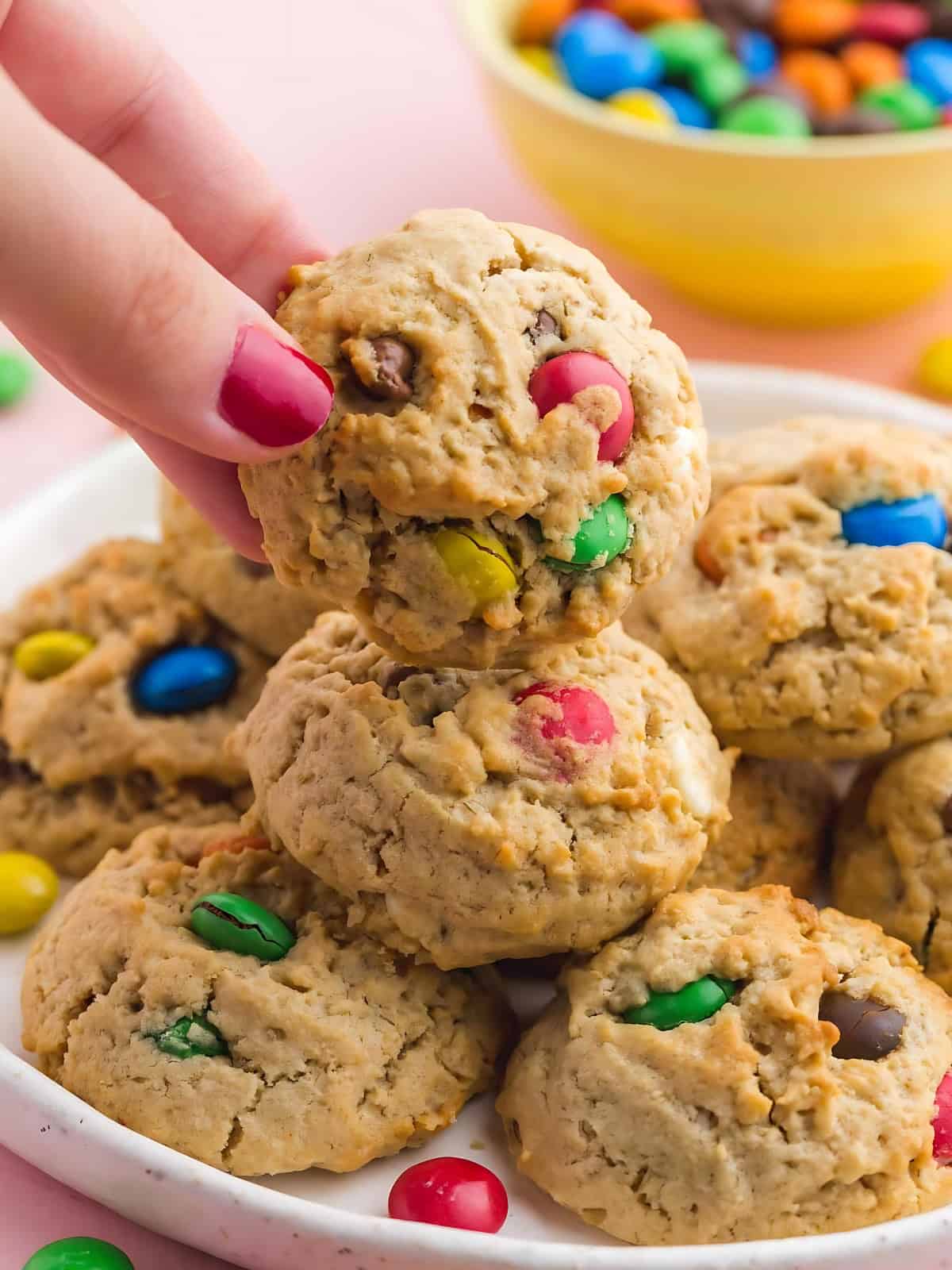 A plate of monster cookies with M&M's.