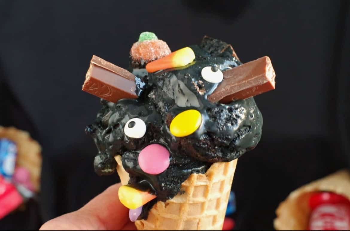 Halloween themed boo batter ice cream topped with M&M's and kitkats.