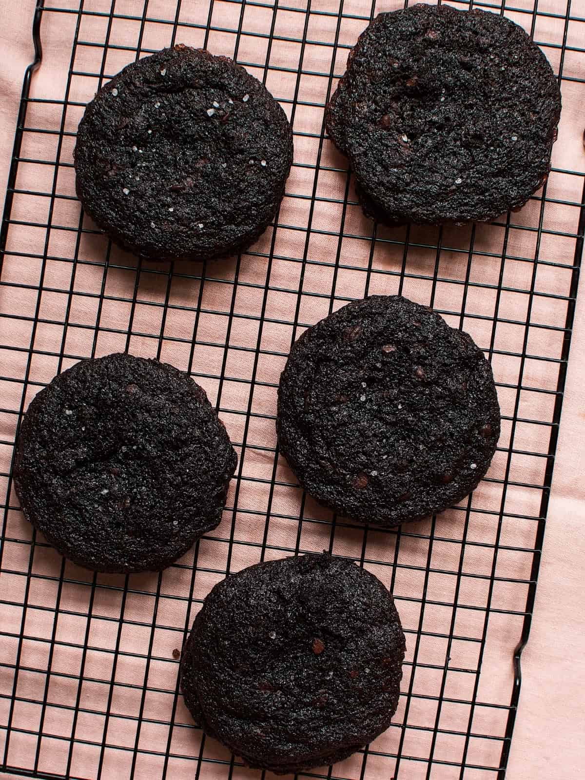 freshly baked brownie cookies, showing their rich, chocolatey texture with slightly crispy edges.