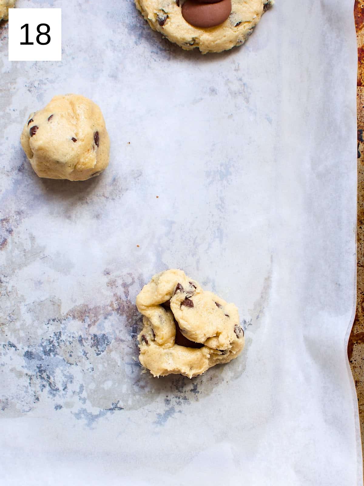 Perfectly scooped cookie batter on a baking tray, ready to be baked into delicious, golden cookies.