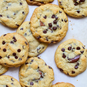 Chocolate-filled cookies with a crispy golden exterior and a rich, gooey chocolate center, perfect for indulging in a sweet treat.