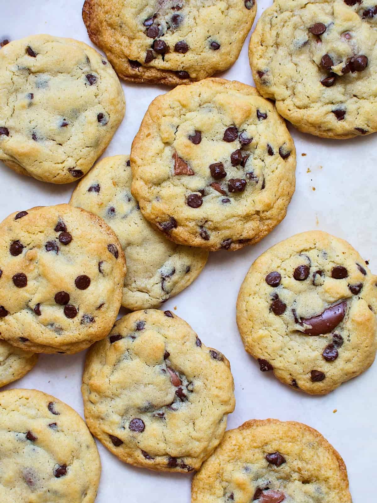 Chocolate-filled cookies with a crispy golden exterior and a rich, gooey chocolate center, perfect for indulging in a sweet treat.