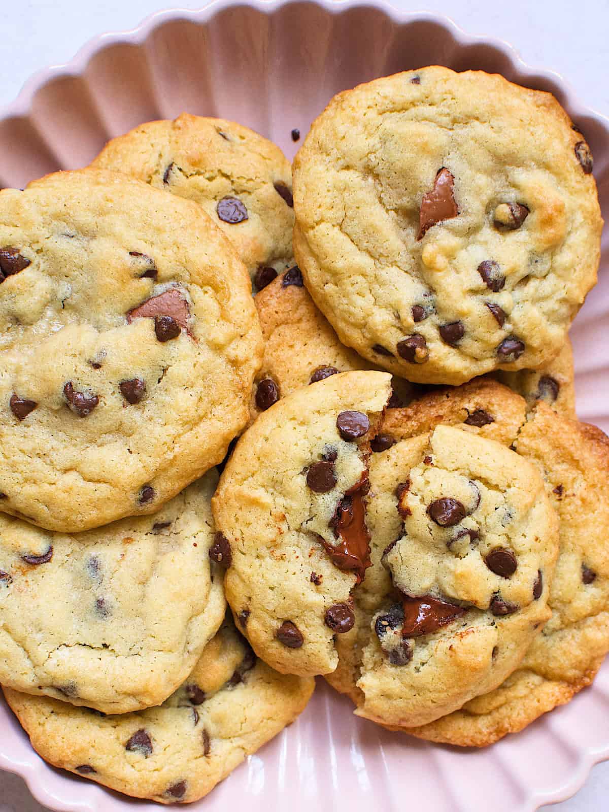 Chocolate-filled cookies with a crunchy outer layer and soft, decadent chocolate inside, perfect for a delicious snack.